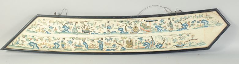 A 19TH CENTURY CHINESE EMBROIDERED SILK PANEL, with various figures and flora, framed and glazed,