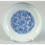 A CHINESE BLUE AND WHITE PORCELAIN DISH, with fine foliate decoration and six-character mark to