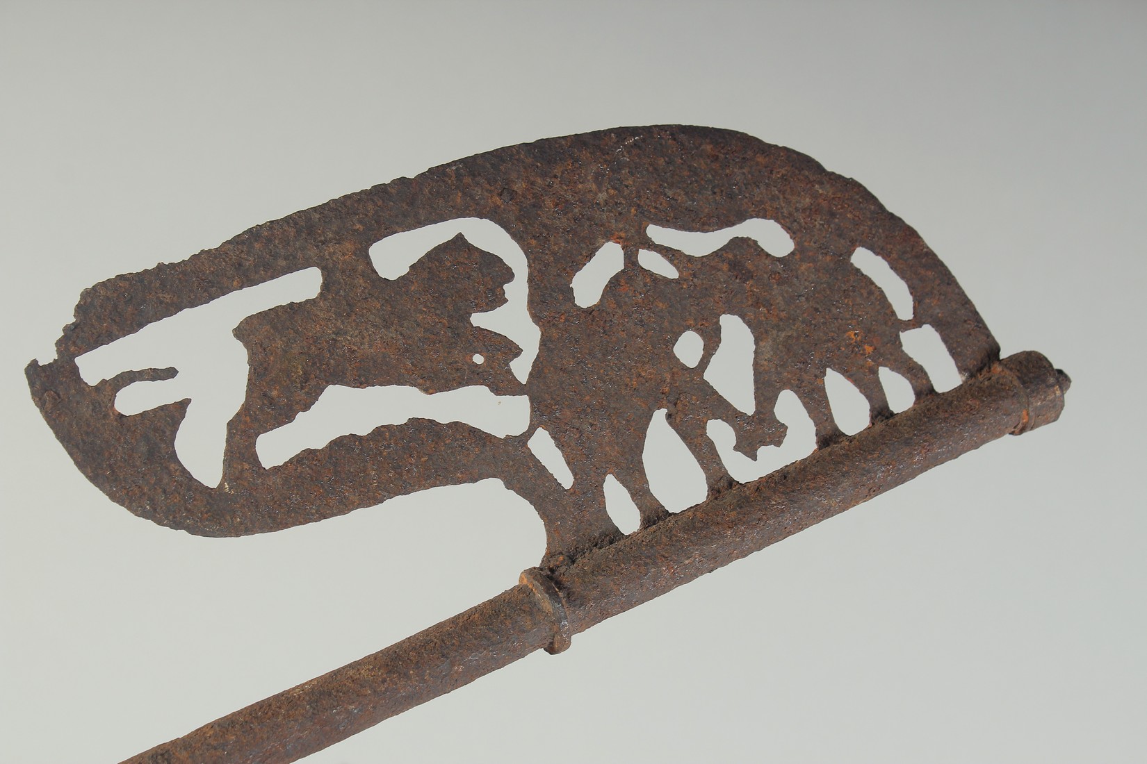 AN 18TH CENTURY INDIAN IRON AXE HEAD with openwork animal decoration, 64cm long, together with an - Image 3 of 3
