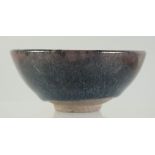 A CHINESE HARE'S FUR GLAZE POTTERY TEA BOWL, 9.5cm diameter.