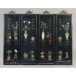 FOUR CHINESE CARVED HARDSTONE OVERLAID LACQUER PANELS, each carved with various hardstones including