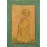 A PERSIAN GAJAR MINIATURE PAINTING OF A FIGURE, in a micro mosaic inlaid frame, glazed, 12.5" x