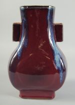 A CHINESE FLAMBE GLAZE TWIN RING HANDLE VASE, 28cm high.