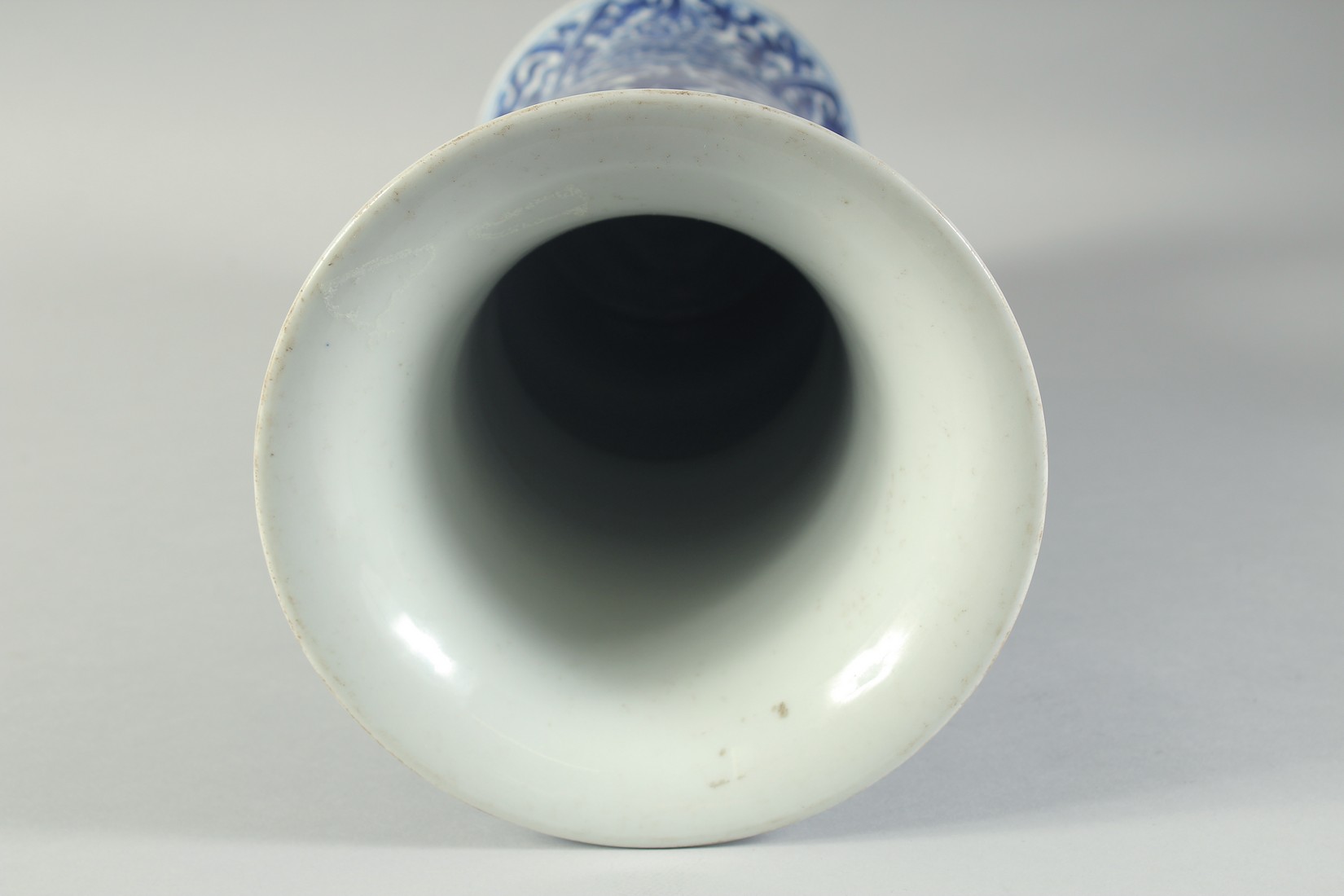 A LATE 19TH CENTURY CHINESE BLUE AND WHITE GU-FORM VASE, painted with floral motifs, 42cm high. - Image 4 of 5