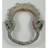 A RARE LARGE 12TH CENTURY CAMBODIAN KHMER BRONZE SADDLE RING, 20cm x 18cm.