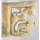 A LARGE 19TH CENTURY INDIAN CARVED ZOOMORPHIC YELLOW STONE ARCHITECTURAL ELEMENT, carved with