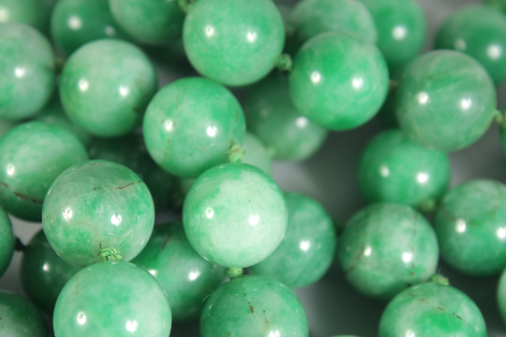 A GOOD APPLE-GREEN JADE BEADED NECKLACE. - Image 2 of 2