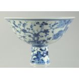 A CHINESE BLUE AND WHITE PORCELAIN STEM CUP, the interior with a band of characters and six-