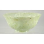 A SMALL CHINESE CLEAR JADE BOWL, 9.5cm diameter.