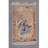 AN AFGHAN PICTORIAL SILK RUG, with seated male and female beneath trees and a border of flora and