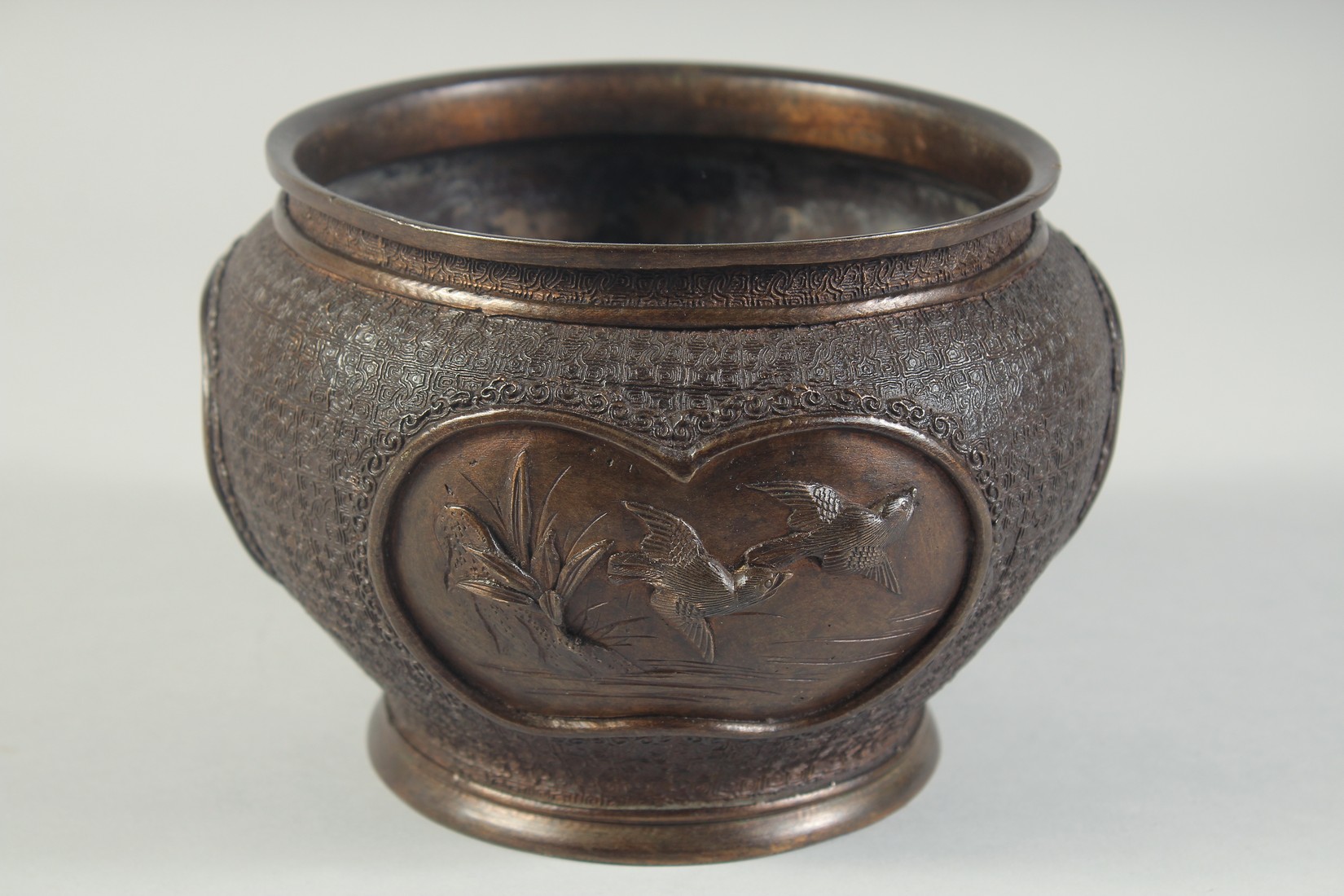 A BRONZE CACHE POT / KORO, decorated with panels of relief birds, character mark to base, 18cm - Image 2 of 7