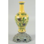 A CHINESE IMPERIAL YELLOW GROUND ENAMEL FLORAL VASE, mounted to a French bronze stand, vase base