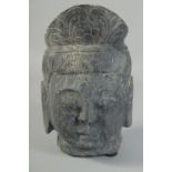 A CARVED STONE BUDDHA HEAD, 26cm x 17cm.