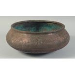 A FINE LARGE 15TH-16TH CENTURY SYRIAN MAMLUK ENGRAVED TINNED COPPER BOWL, 27cm diameter.