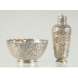 AN INDIAN SILVER PERFUME BOTTLE AND SYRIAN GOLD INLAID SILVER CUP, (2).