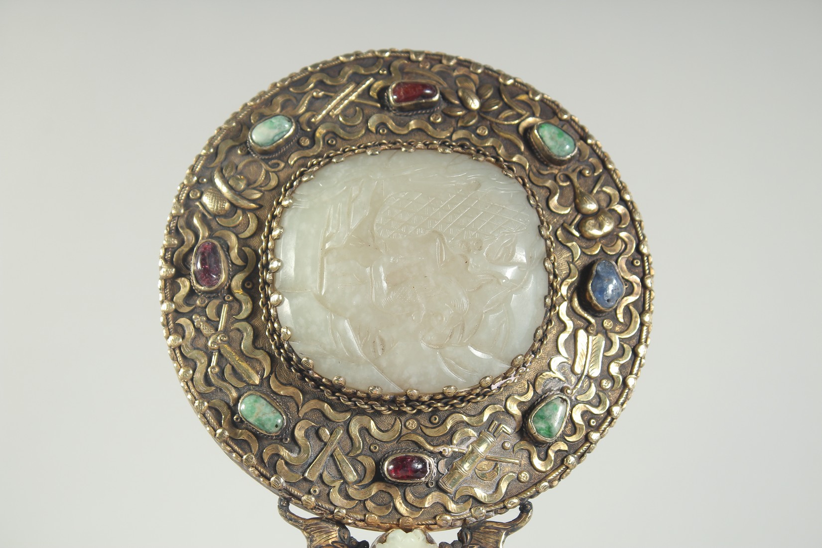 A CHINESE CARVED JADE AND GILT METAL HAND MIRROR, the handle made from a carved jade chilong belt - Image 4 of 4