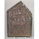 A 19TH CENTURY SOUTH INDIAN EMBOSSED BRASS PLAQUE, with figure on horseback, 18.5cm x 13cm.