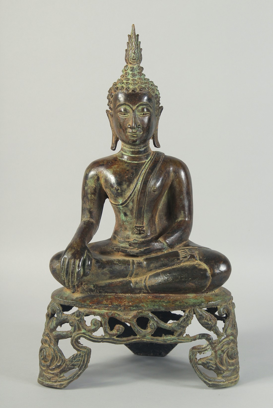 A FINE LARGE SOUTH EAST ASIAN BRONZE SEATED BUDDHA, possibly Thai, raised on openwork base, 45cm