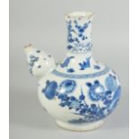 A CHINESE BLUE AND WHITE PORCELAIN EWER KENDI, painted with birds and native flora, 20.5cm high.