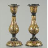 A PAIR OF INDIAN KASHMIRI LACQUERED CANDLESTICKS, 16cm high.