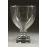 AN 18TH CENTURY ENGLISH GLASS GOBLET. Provenance: Delomosre. 6ins high.