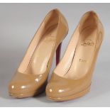 A PAIR OF CHRISTIAN LOUBOUTIN COFFEE COLOUR SHOES SIZE 37.