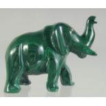 A CARVED MALACHITE ELEPHANT. 2.5ins long.