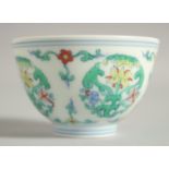 A CHINESE DOUCAI PORCELAIN CUP, 7.5cm diameter.