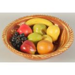 A SLIPWASH CIRCULAR BOWL, 13ins diameter and NINE VARIOUS WAX FRUITS