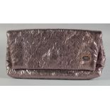 A LOUIS VUITTON FOLDING SILVER METALLIC CLUTCH BAG with folding front. 12ins long, 7ins deep, in