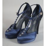 A PAIR OF CHANEL BLUE SATIN SHOES with diamantes. Size 37.