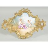 A GOOD SQUARE SHAPED PORCELAIN PLAQUE ON A STAND, painted with a young lady and a cupid on a good