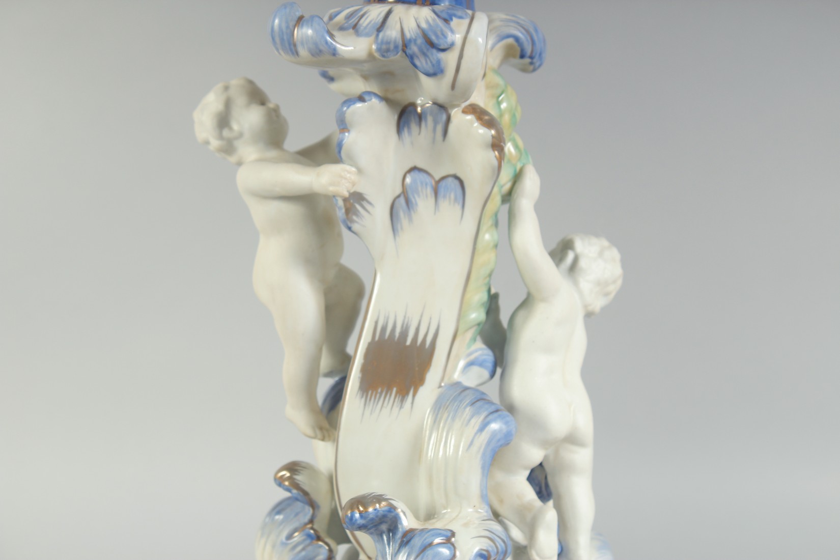 A GOOD PAIR OF SEVRES STYLE EIGHT BRANCH CANDELABRA with cupid support on blue bases. 1ft 11ins - Image 5 of 5