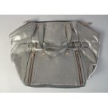 A GOOD YVES ST. LAURENT SILVER/METALLIC LEATHER BAG. 1ft 6in long overall, 1ft high.