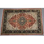 A PERSIAN PART SILK RUG with a stylised floral decoration. 135cm x 81cm.