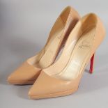 A PAIR OF CHRISTIAN LOUBOUTIN BEIGE SHOES Size 37.
