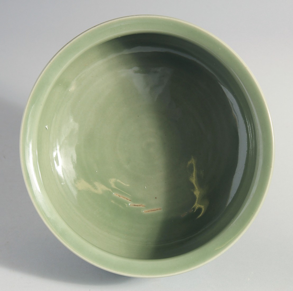A LARGE CHINESE CELADON GLAZE BOWL, carved with dragon and the flaming pearl of wisdom, 25.5cm - Image 3 of 5