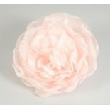 A CHANEL SILK PINK FLOWER BROOCH. Signed.