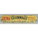 AN ENAMEL GUINNESS SIGN. 5ins x 22ins.