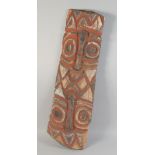 AN 18TH CENTURY CARVED ANCESTORS PANEL from Papua New Guinea. 36ins long.