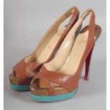 A PAIR OF CHRISTIAN LOUBOUTIN DARK TAN SHOES. Size 37.