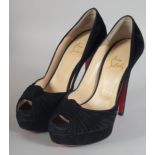 A PAIR OF CHRISTIAN LOUBOUTIN BLACK SUEDE SHOES. Size 37.5.