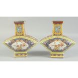 A PAIR OF CHINESE PORCELAIN FAN SHAPED VASES. 8.5ins high.