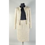 A CHANEL TWO PIECE BOUCEL LADIES SUIT, with ostrich feather trim. Size 40