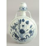 A CHINESE BLUE AND WHITE TWIN HANDLE MOON FLASK, with central floral spray, 30cm high.