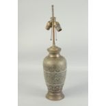 AN ETCHED PERSIAN BRASS LAMP. 26ins high with fittings.