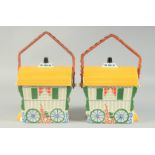 A PAIR OF PORCELAIN GYPSY WAGON BASKETS with wicker handles. 7ins.