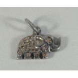 A SMALL DIAMOND ELEPHANT PENDANT.