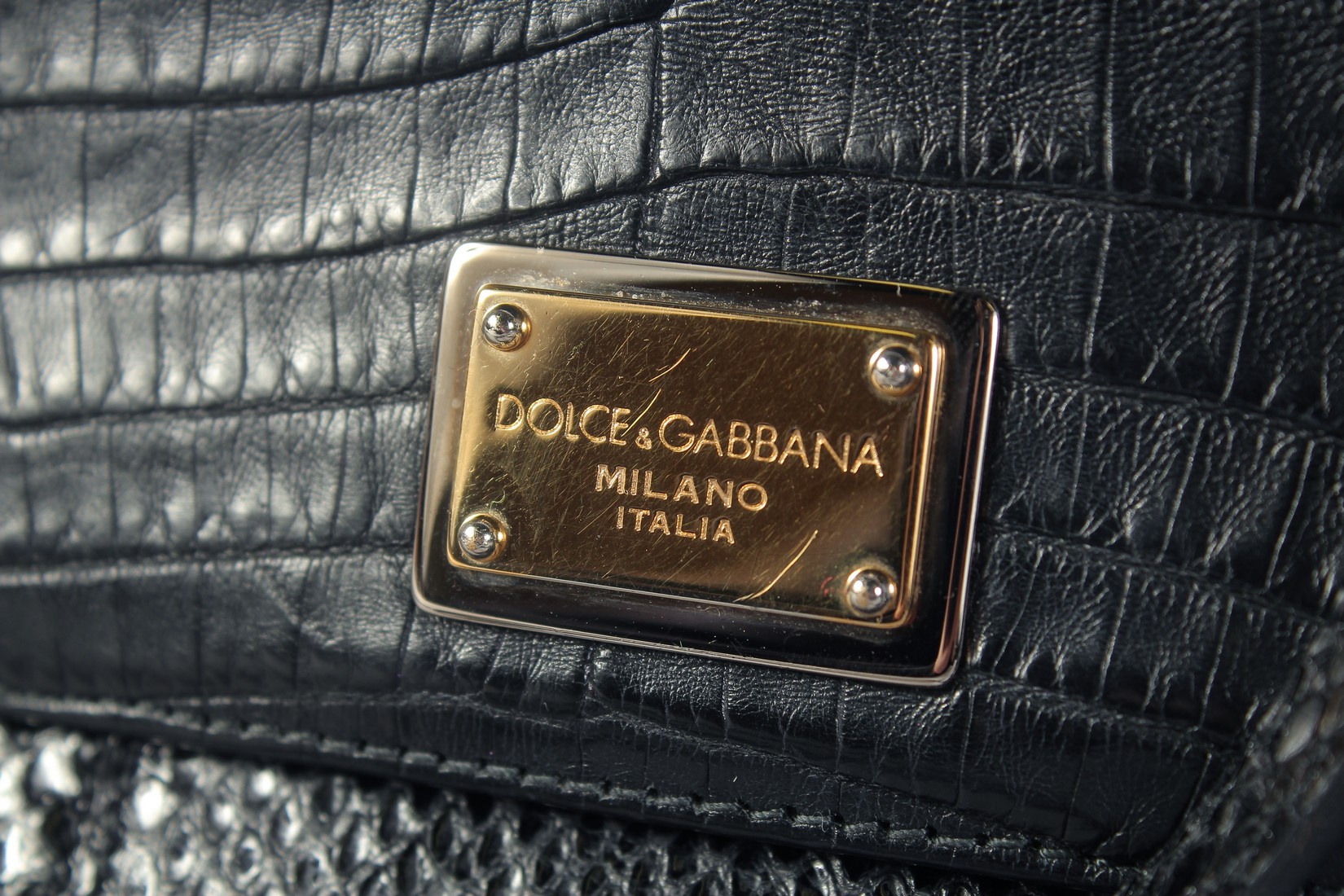 A GOOD DOLCE AND GABBANA BLACK CROCODILE OR SNAKESKIN BAG. 9ins long, 7ins high, in a dust bag. - Image 2 of 7