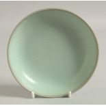 A CHINESE RU WARE DISH. 14cm diameter.